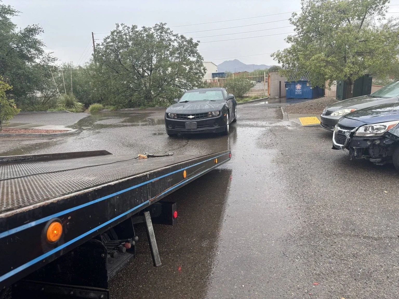 Fuel delivery to a stranded vehicle by Sam's Towing in Tucson